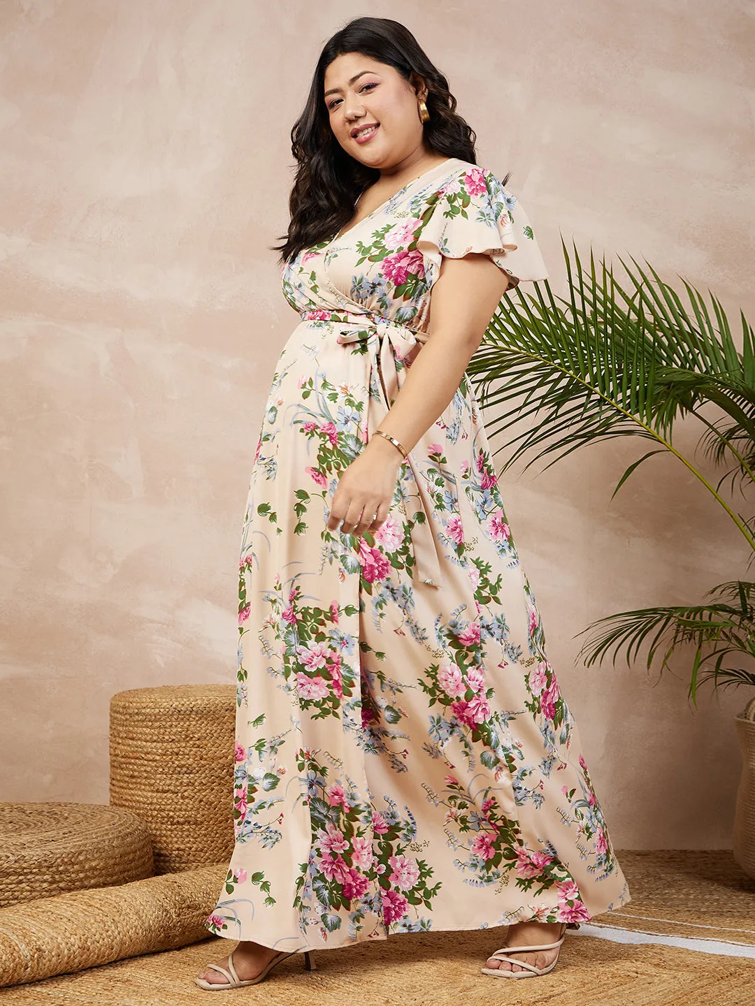 Berrylush Women Plus Size Beige & Pink Floral Printed V-Neck Flutter Sleeve Tie-Up Waist Flared Maxi Dress