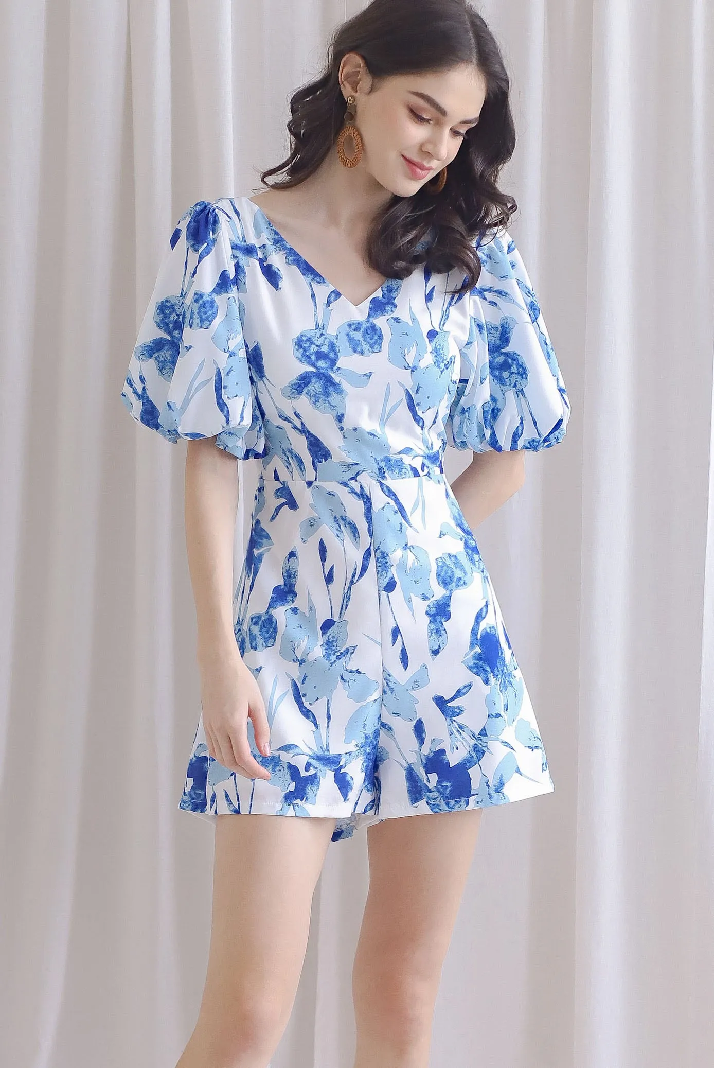 Poppie Puffy Sleeve Bow Back Romper In Blue Floral