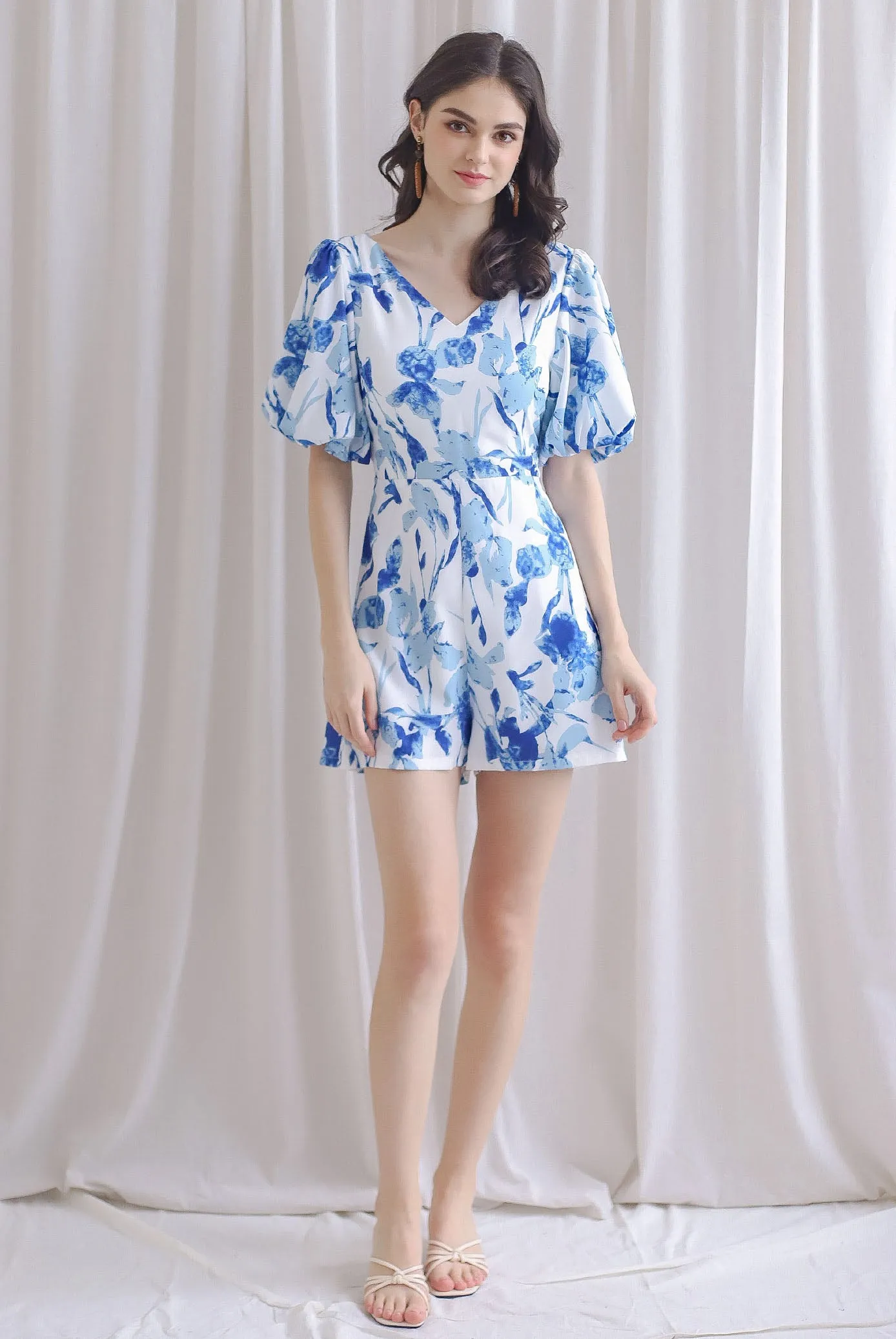 Poppie Puffy Sleeve Bow Back Romper In Blue Floral